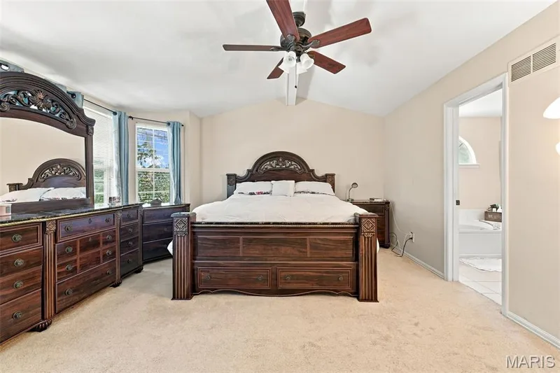 Vaulted primary suite with bay windows — 5872 Wellington Farm Drive, St Charles, MO 63304