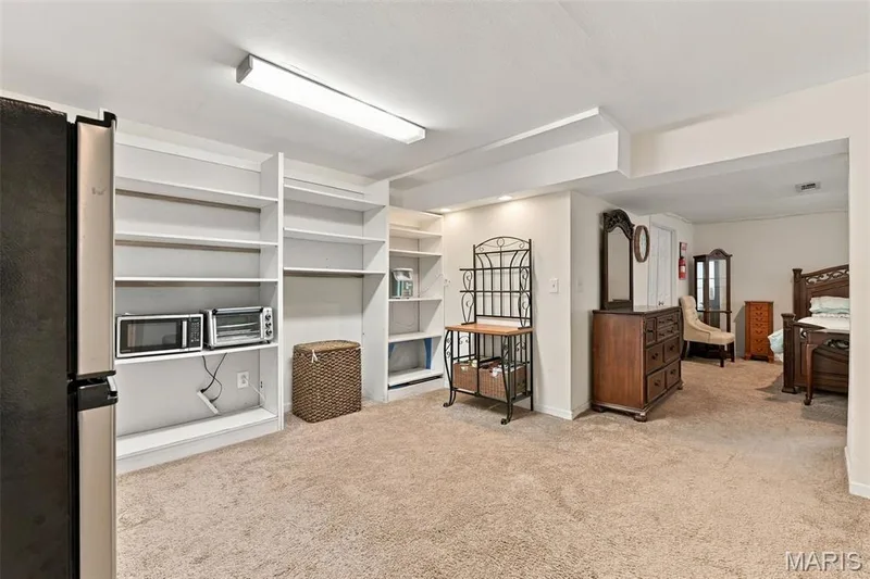 Lower level currently used as In-law suite with sitting area - fridge & modern conveniences — 5872 Wellington Farm Drive, St Charles, MO 63304