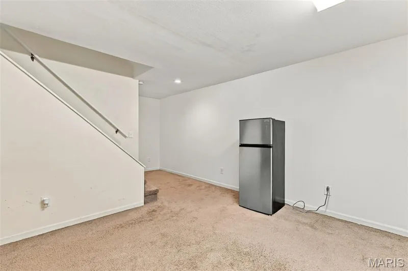 Retreat down stairs to the mother in law quarters, guest area or additional family hang out — 5872 Wellington Farm Drive, St Charles, MO 63304