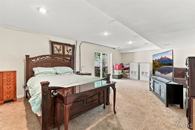 Lower level rec room or 5th bedroom for additional family or guests — 5872 Wellington Farm Drive, St Charles, MO 63304