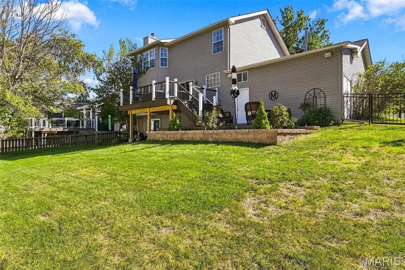 spacious back yard area, fully fenced.... plenty of family fun and relaxation — 5872 Wellington Farm Drive, St Charles, MO 63304