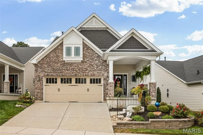 Brick and siding exterior with gabled roof lines — 17028 Fire Glow Drive, Ballwin, MO 63011