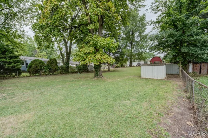 2 storage sheds in the  LARGE fenced-in backyard.  Room for the pets to run here! — 3215 Janton Lane, St Charles, MO 63301