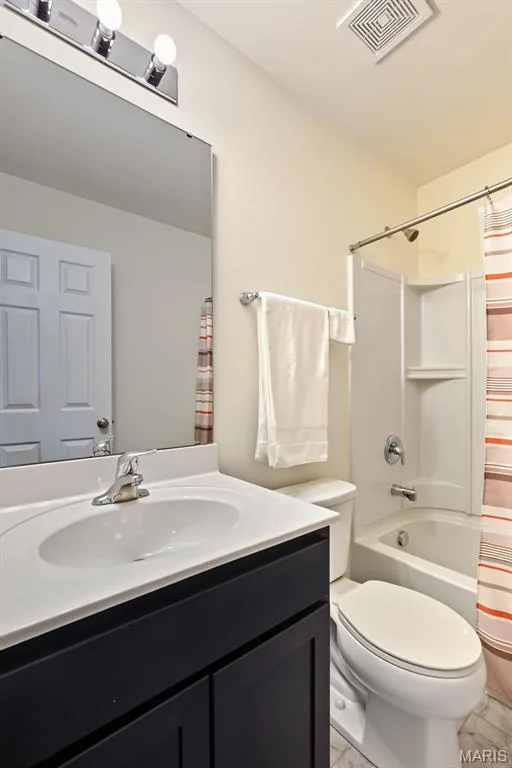 Modern vanity with an integrated sink and chrome faucet — 284 Crestfield Court, St Charles, MO 63301