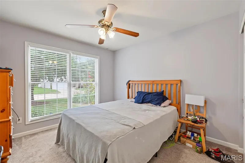 Neutral-toned walls with carpet flooring — 8 Soenker Circle, St Peters, MO 63376