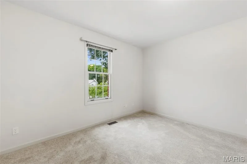 Carpeted flooring, white walls, and a single window with blinds — 11 Silver Leaf Court, Lake St. Louis, MO 63367