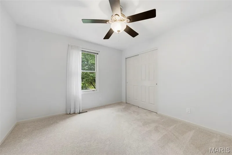 Neutral wall paint and carpeted flooring — 11 Silver Leaf Court, Lake St. Louis, MO 63367