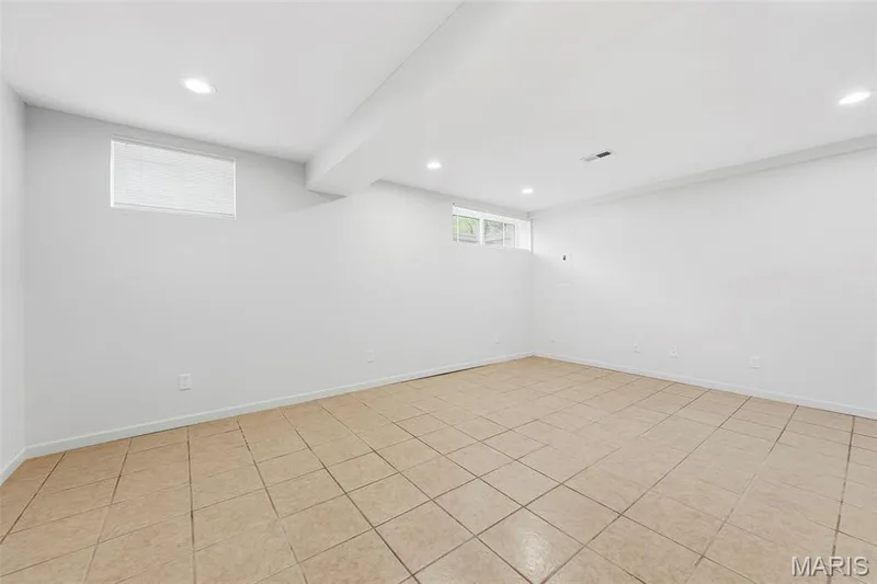 Recessed lighting, tile flooring, and white painted walls — 11 Silver Leaf Court, Lake St. Louis, MO 63367