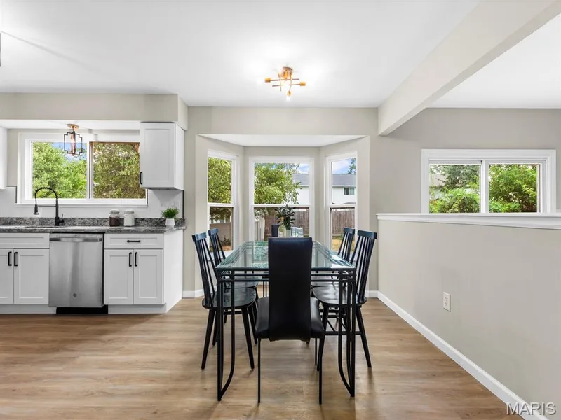 Dining area with brand new bay windows — 920 Blake Court, St Peters, MO 63376