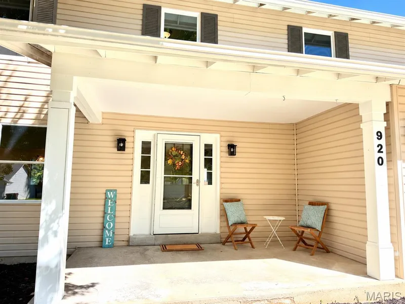 Large Front Porch welcomes guests — 920 Blake Court, St Peters, MO 63376