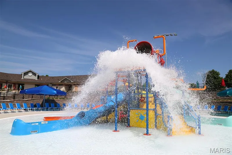 Splash pad with water bucket feature and slides — 202 Kunze Drive, St Charles, MO 63303