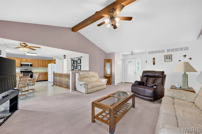 View from the corner of the front entry hallway, and Kitchen — 1436 Snowbird Lane, O'Fallon, MO 63366