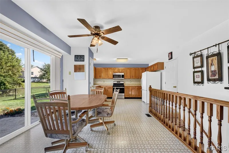 View from Living Room Area into the Kitchen — 1436 Snowbird Lane, O'Fallon, MO 63366