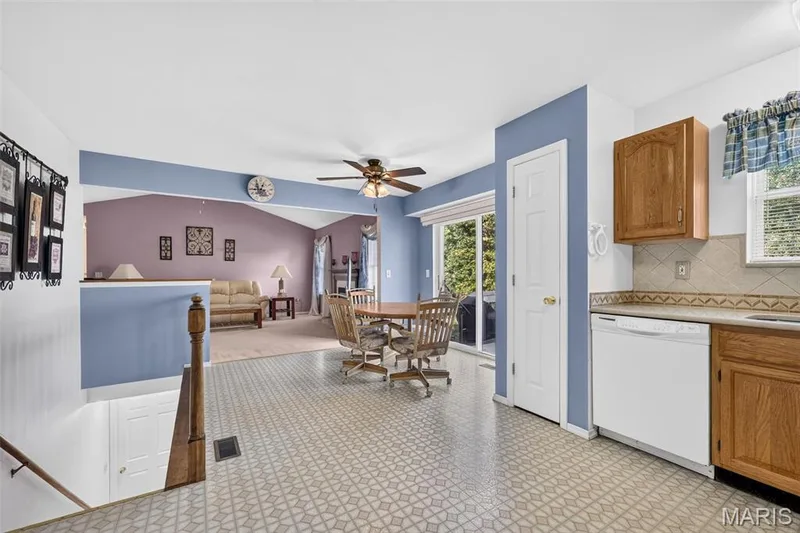 View from the Kitchen to the Breakfast Room Area and Patio Sliding Glass Door — 1436 Snowbird Lane, O'Fallon, MO 63366