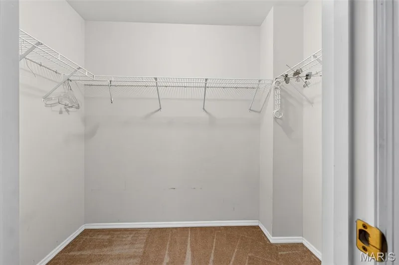 Primary Bedroom Walk-In Closet — 1436 Snowbird Lane, O'Fallon, MO 63366