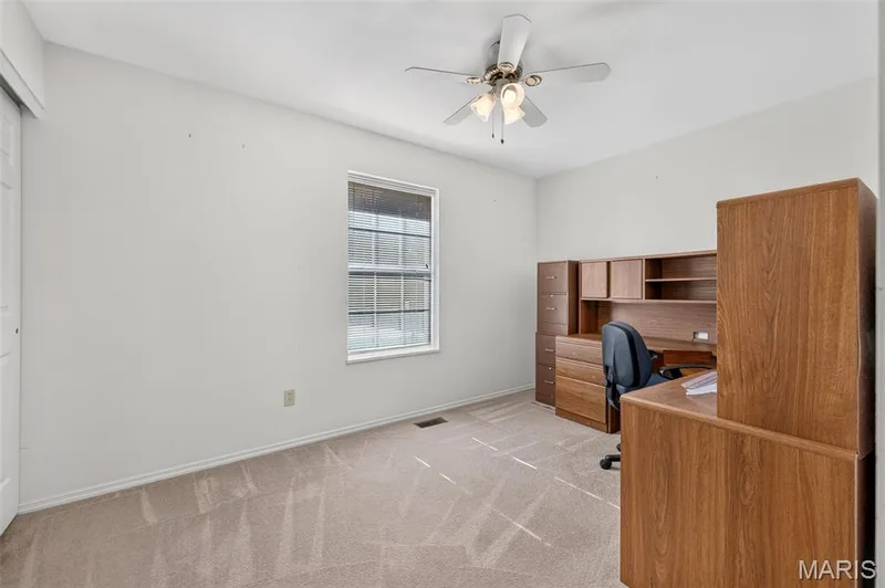 Bedroom with Ceiling Fan and Carpeting — 1436 Snowbird Lane, O'Fallon, MO 63366