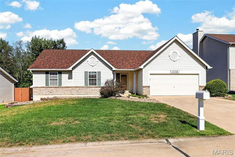 View of the Front yard and Driveway — 1436 Snowbird Lane, O'Fallon, MO 63366