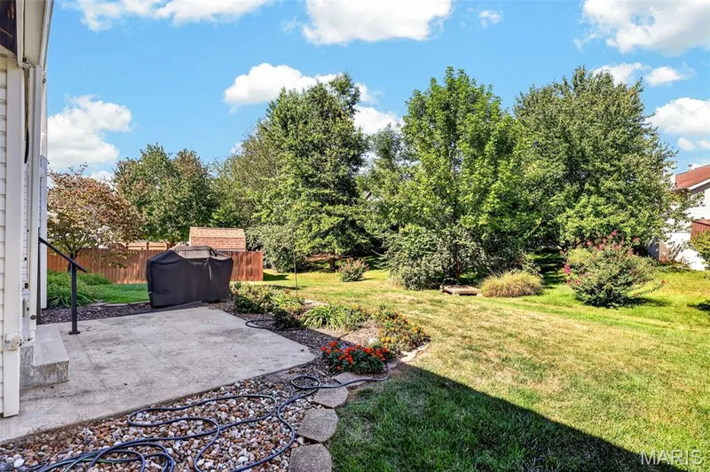 Backyard with Patio, Gas Grill and Retractable Awning — 1436 Snowbird Lane, O'Fallon, MO 63366