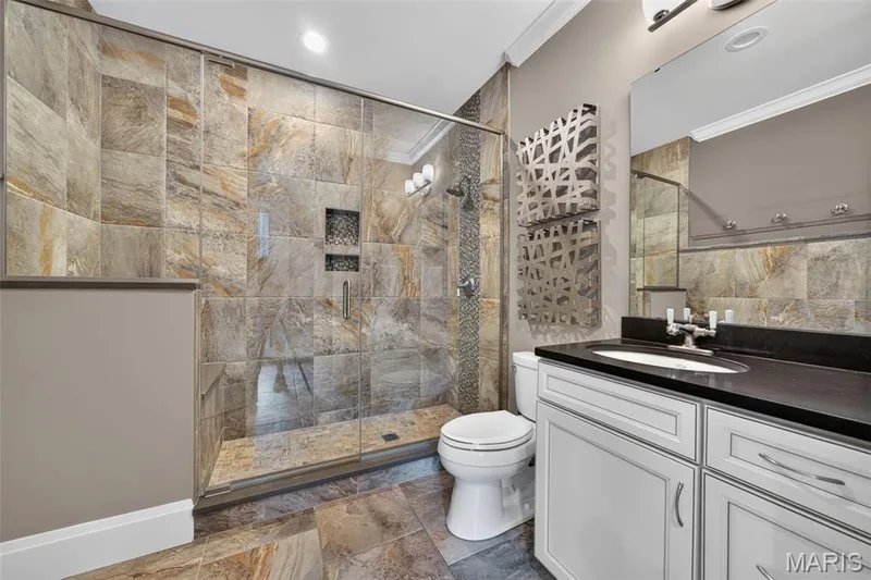 Pool bathroom access from backyard to keep pool guests from walking through main areas of home — 2000 Diehr Road, Wentzville, MO 63385