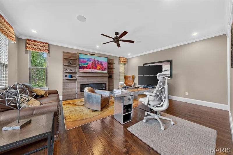 Private home office with electric fireplace and ceiling fan — 2000 Diehr Road, Wentzville, MO 63385