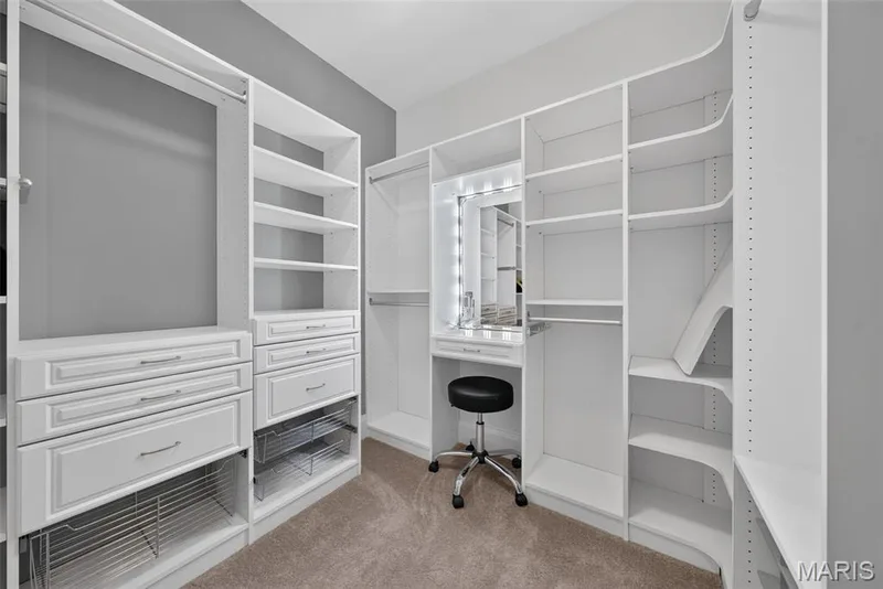 Custom shelved closet with illuminated vanity — 2000 Diehr Road, Wentzville, MO 63385