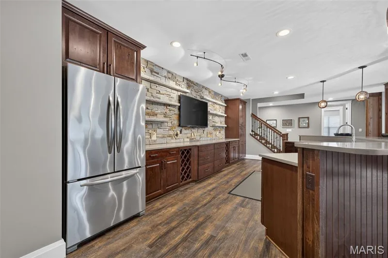 Kitchen area with fridge, dishwasher, and microwave — 2000 Diehr Road, Wentzville, MO 63385