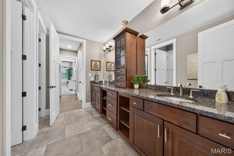 Bathroom with double vanities and private shower room — 2000 Diehr Road, Wentzville, MO 63385