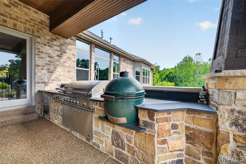 Built in 4 burner DCS gas grill with cabinets and extra large green egg — 2000 Diehr Road, Wentzville, MO 63385