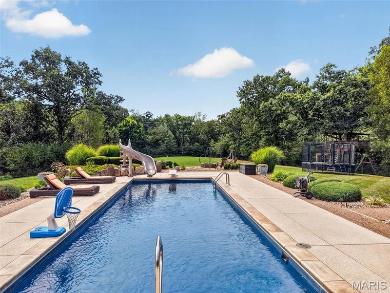 Large saltwater pool with diving board and slide — 2000 Diehr Road, Wentzville, MO 63385