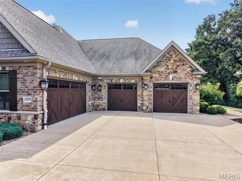 4 car oversized garage, with additional side door for ATV access — 2000 Diehr Road, Wentzville, MO 63385