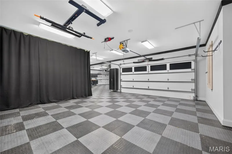 37x27 double car garage door, with gray/black garage tiled floor — 2000 Diehr Road, Wentzville, MO 63385