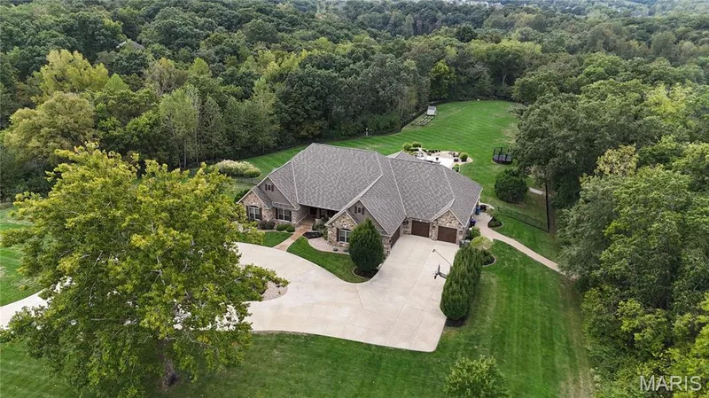 Luxurious custom finishes and extraordinary outdoor setting — 2000 Diehr Road, Wentzville, MO 63385