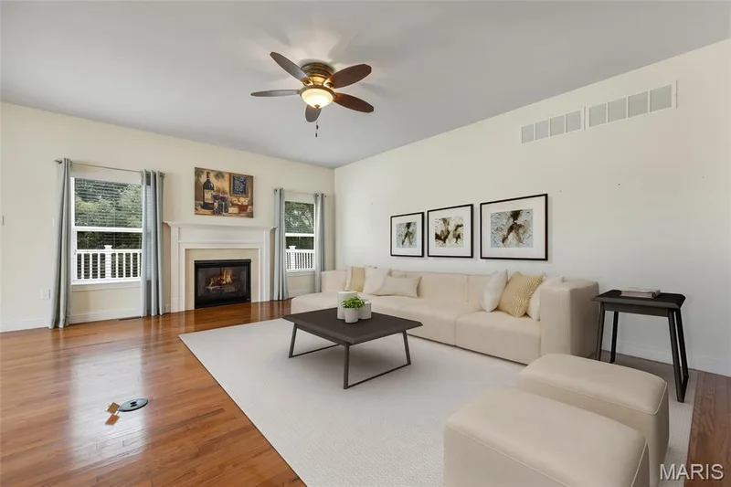phot has been virtually staged showing open concept great room — 1216 Emerald Gardens Drive, St Peters, MO 63376