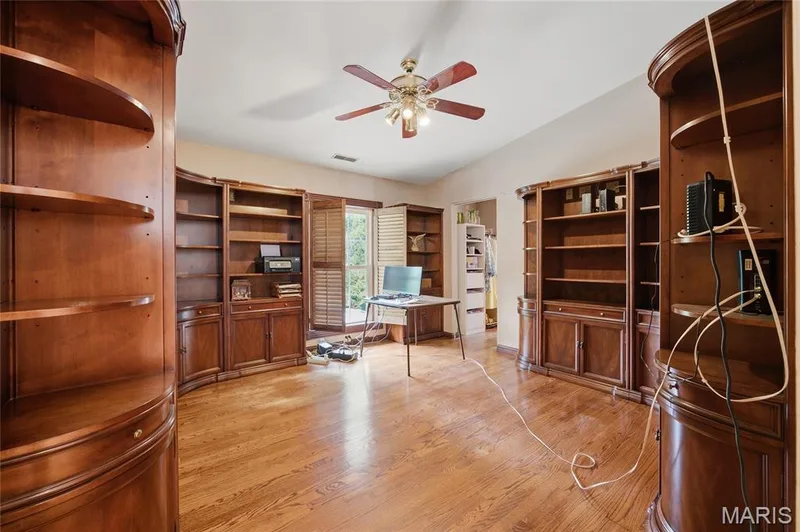 Wood flooring, built-in shelving, makes this the perfect office space or additional bedroom — 76 River Valley Drive, Chesterfield, MO 63017