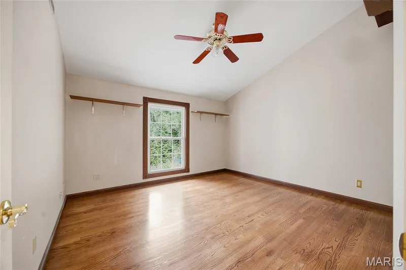 3rd bedroom on the upper level with hardwood flooring — 76 River Valley Drive, Chesterfield, MO 63017