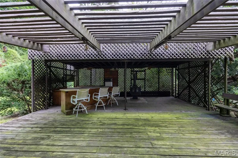 Large deck off the rear of the property is the perfect gathering spot for large parties — 76 River Valley Drive, Chesterfield, MO 63017