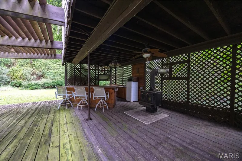 Wood stove and bar make this the perfect spot on a nice night outdoors — 76 River Valley Drive, Chesterfield, MO 63017