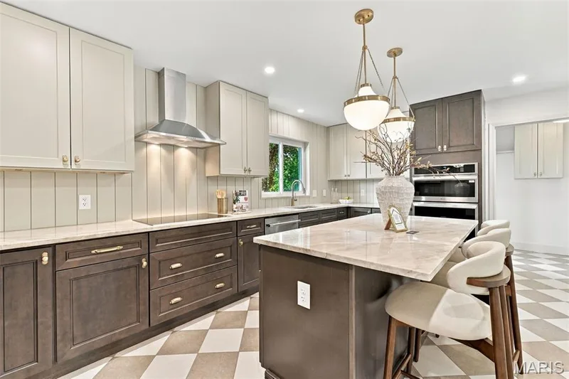 New Two-tone custom cabinetry, quartz countertops, stainless steel appliances, wall oven & micro, Elec Cooktop w/ Range Hood, central island with seating, pendant lighting, shiplap backsplash and checkered tile flooring — 621 Claymont Estates Drive, Chesterfield, MO 63017