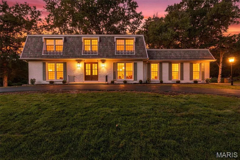 White brick exterior with a cedar tone upgraded dormer style siding and New Roof — 621 Claymont Estates Drive, Chesterfield, MO 63017