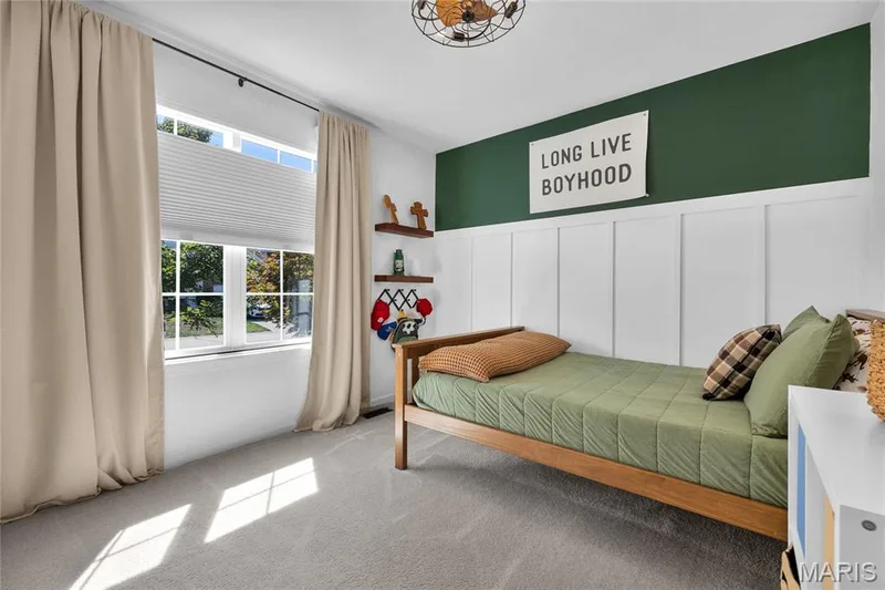 Board and batten accent wall with a dark green upper section — 5507 Dressel Drive, Cottleville, MO 63304