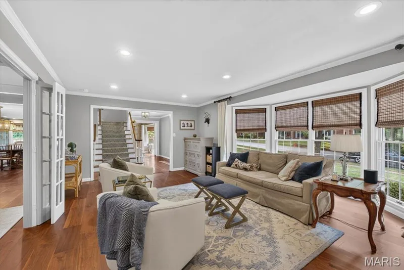 Large bay windows in living room offers view of front yard — 1165 Templeton Place, Chesterfield, MO 63017