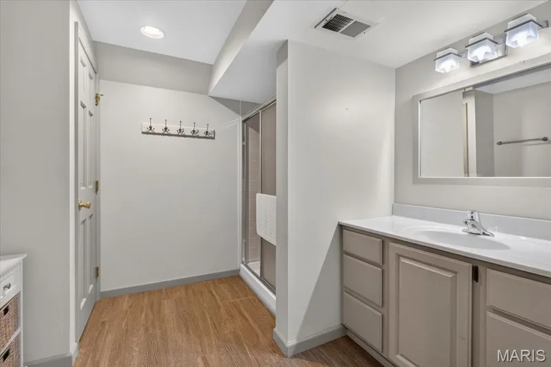 A full bath in lower level works well for pool guests — 1165 Templeton Place, Chesterfield, MO 63017