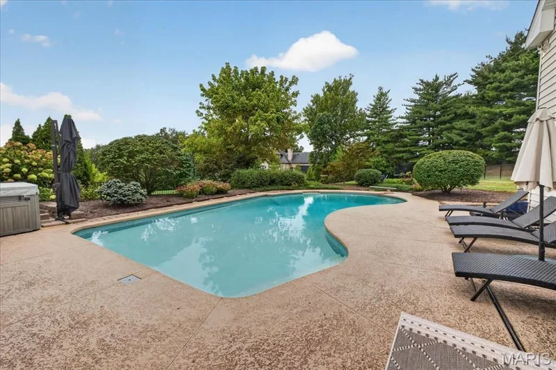 A nice pool deck with space for lounging — 1165 Templeton Place, Chesterfield, MO 63017