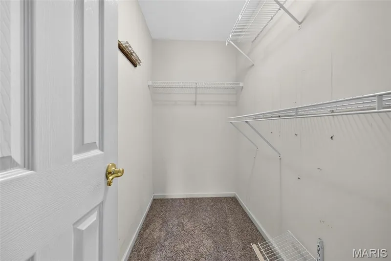 Primary Bedroom Closet — 2960 Sylvan Lane #5D, St Charles, MO 63301