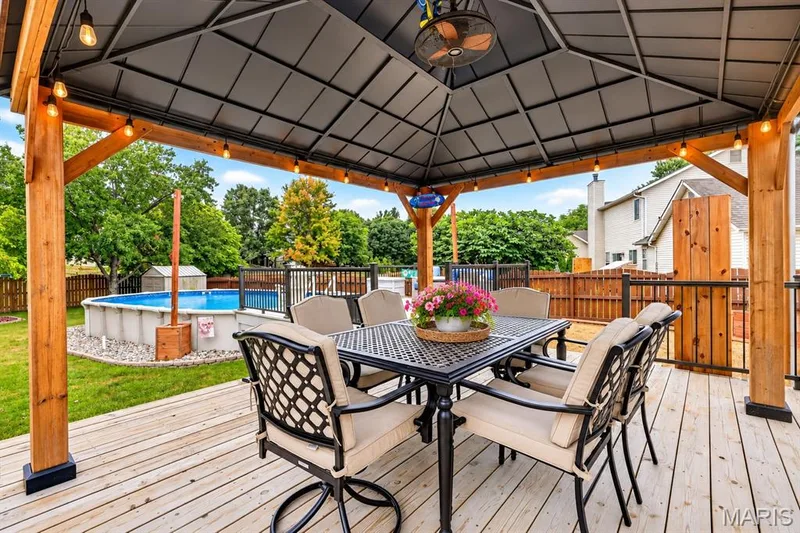 cover patio great for entertaining enjoy those pool days — 2750 Red Cedar Parc Drive, O'Fallon, MO 63368