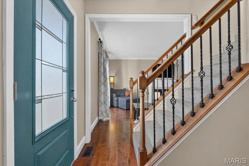 Step inside to 9-foot ceilings, engineered hardwood floors, and a bright, open layout — 2265 Mette Road, Wentzville, MO 63385