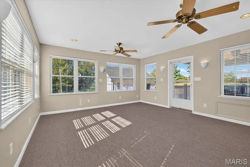 Sun-filled sunroom overlooking the backyard — 2265 Mette Road, Wentzville, MO 63385