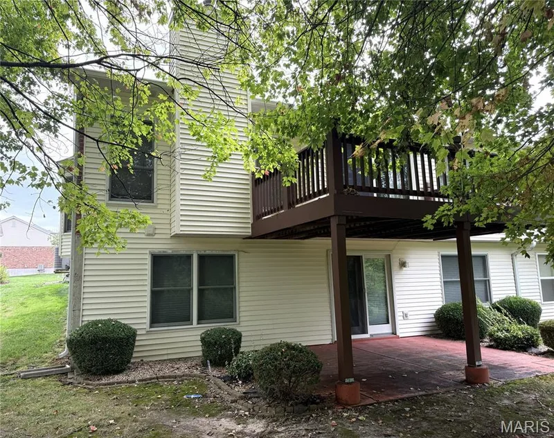 Lower level walk-out to patio.  Deck off kitchen. — 18 Country Bluff Court, St Charles, MO 63301