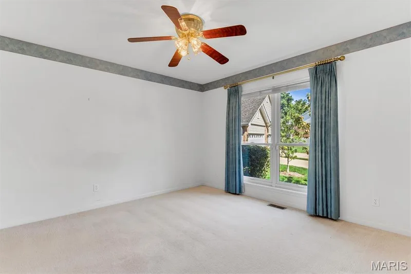 Second main floor bedroom could be home office.  Has double door closet. — 18 Country Bluff Court, St Charles, MO 63301