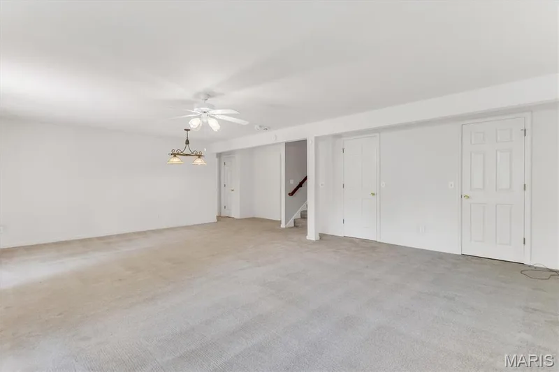 Left goes to third bedroom, center living area, right storage. — 18 Country Bluff Court, St Charles, MO 63301